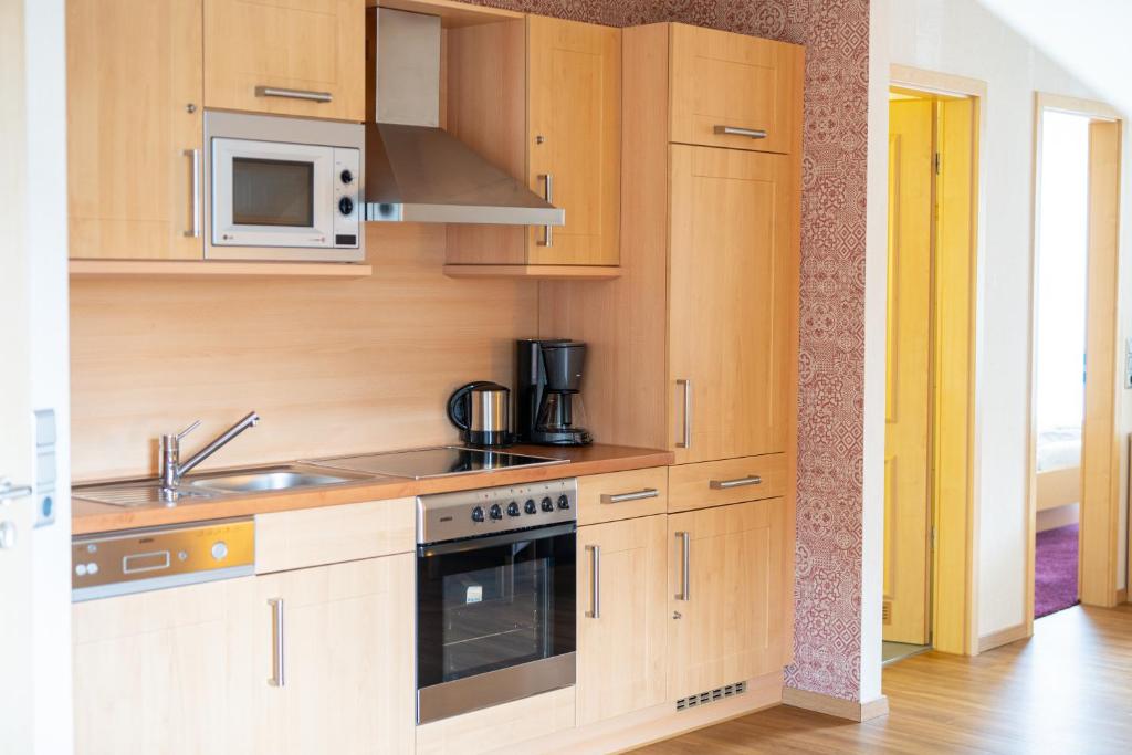 Kuchyň nebo kuchyňský kout v ubytování Landhaus Bergkrone