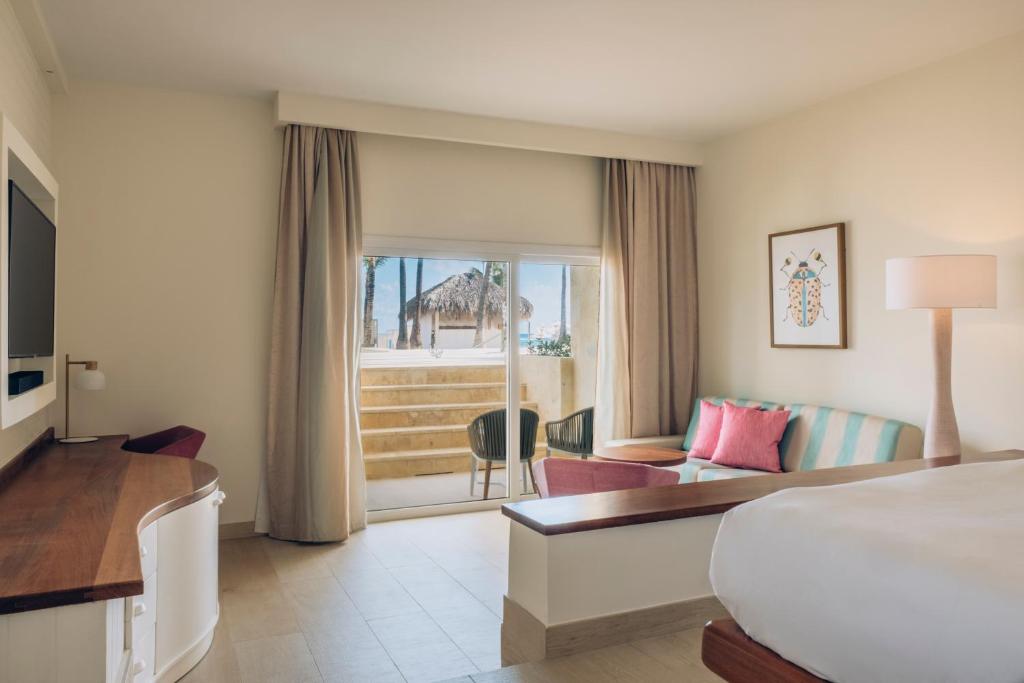 TV a/nebo společenská místnost v ubytování Iberostar Selection Coral Bávaro - All Inclusive