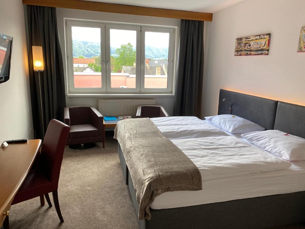 Voodi või voodid majutusasutuse Skycity Hotel Atrigon toas