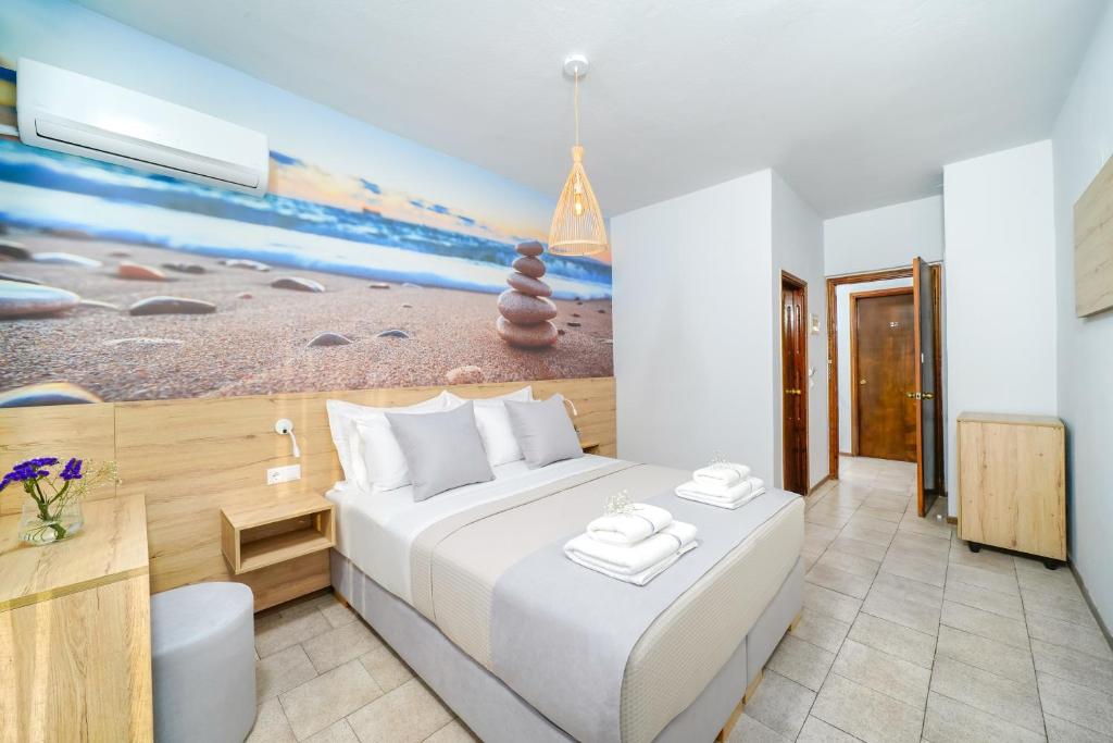 Postel nebo postele na pokoji v ubytování Nefeli Fresh Hotel by Del Mare