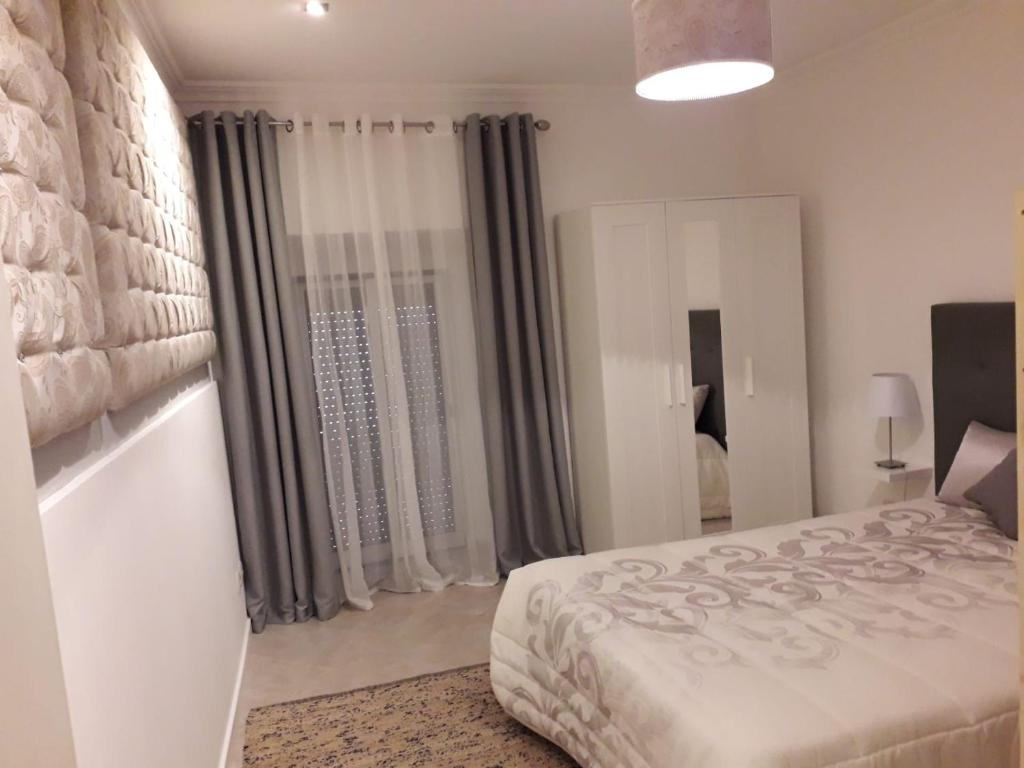 Postel nebo postele na pokoji v ubytování Casa da Aldeia