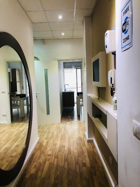 TV a/nebo společenská místnost v ubytování B&B Degli Artisti Suite