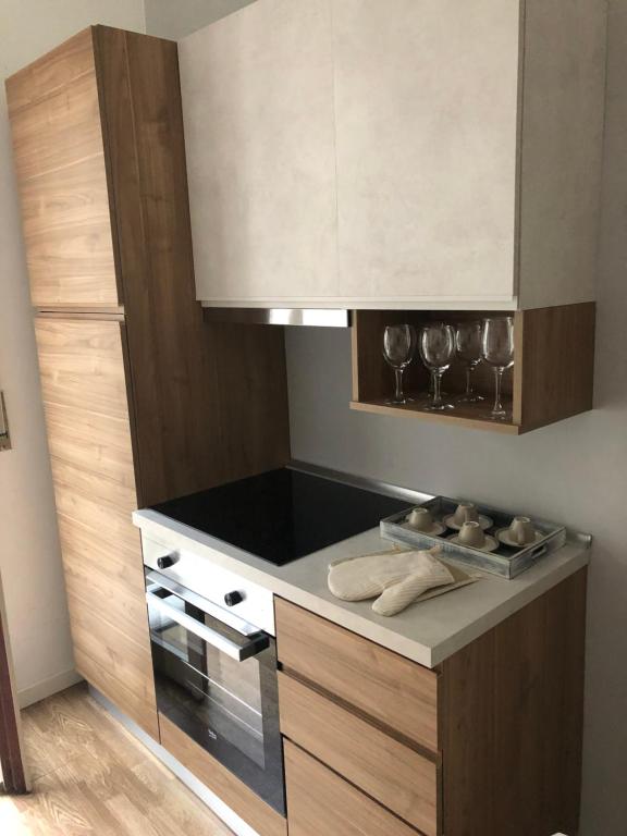 Kuchyň nebo kuchyňský kout v ubytování B&B Degli Artisti Suite