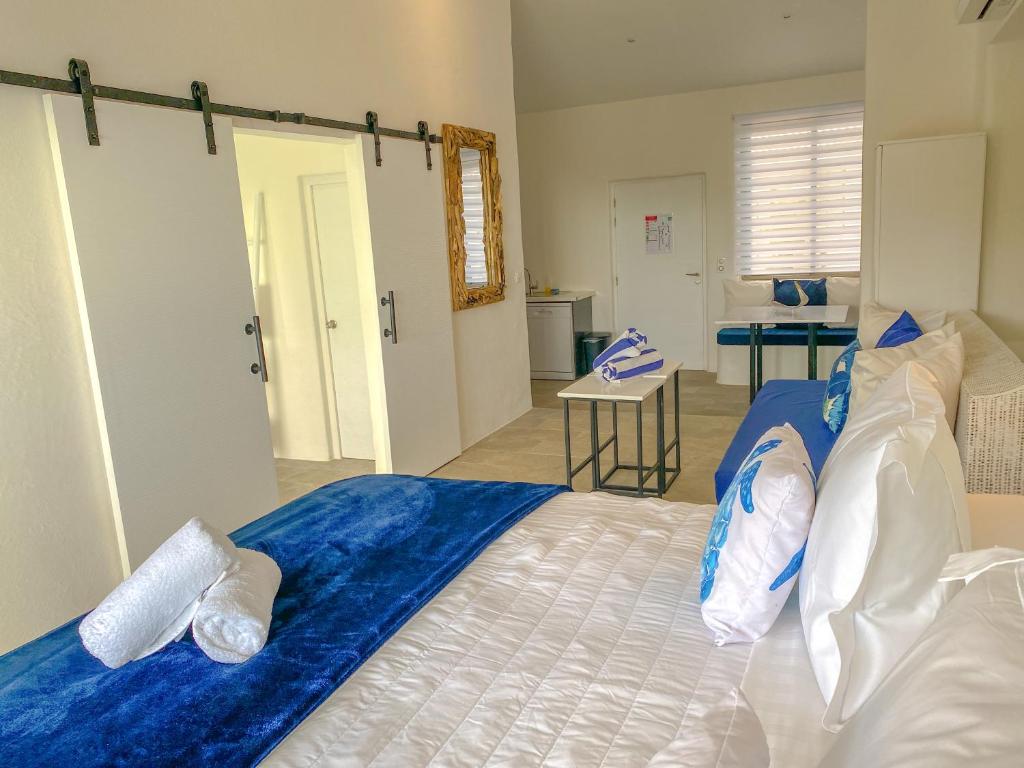 Postel nebo postele na pokoji v ubytování Ninamu Pearl Guest House
