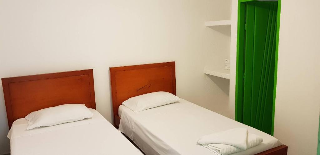 Postel nebo postele na pokoji v ubytování Hotel El Don