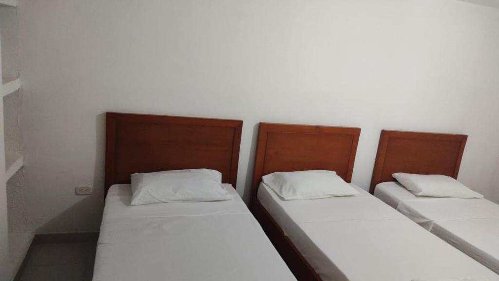 Postel nebo postele na pokoji v ubytování Hotel El Don