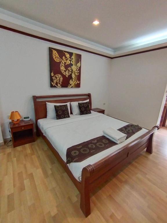 Postel nebo postele na pokoji v ubytování WeRest Hotel