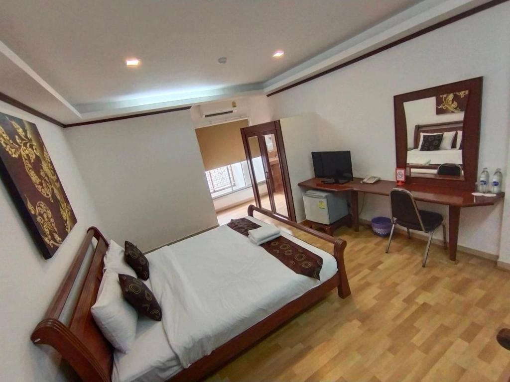 Postel nebo postele na pokoji v ubytování WeRest Hotel