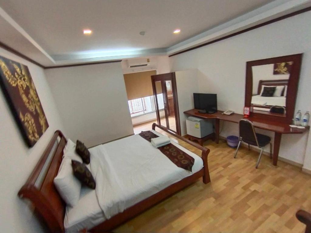 Postel nebo postele na pokoji v ubytování WeRest Hotel
