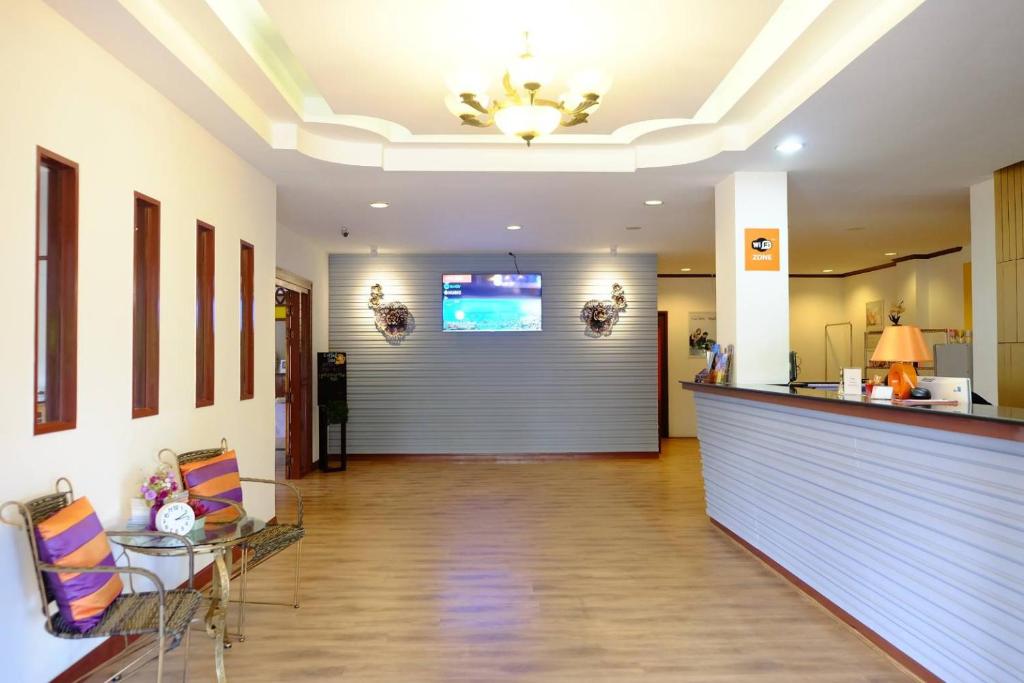 TV a/nebo společenská místnost v ubytování WeRest Hotel