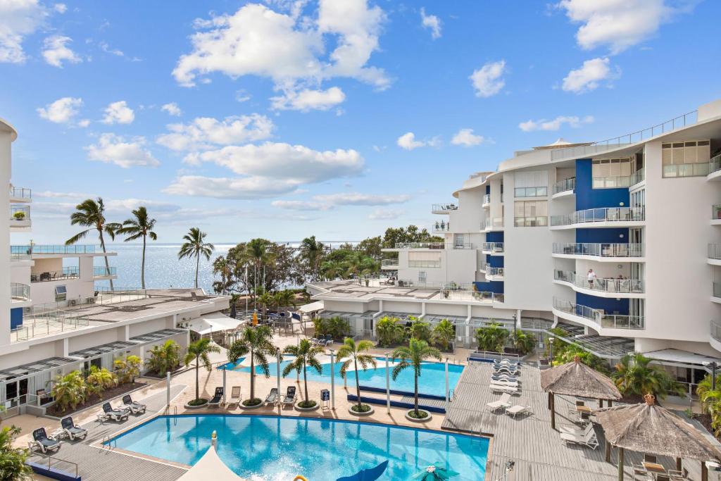 an image of the pool at the resort at Hamptons Meets Hervey Bay In Upmarket Resort - Ocean Views in Hervey Bay