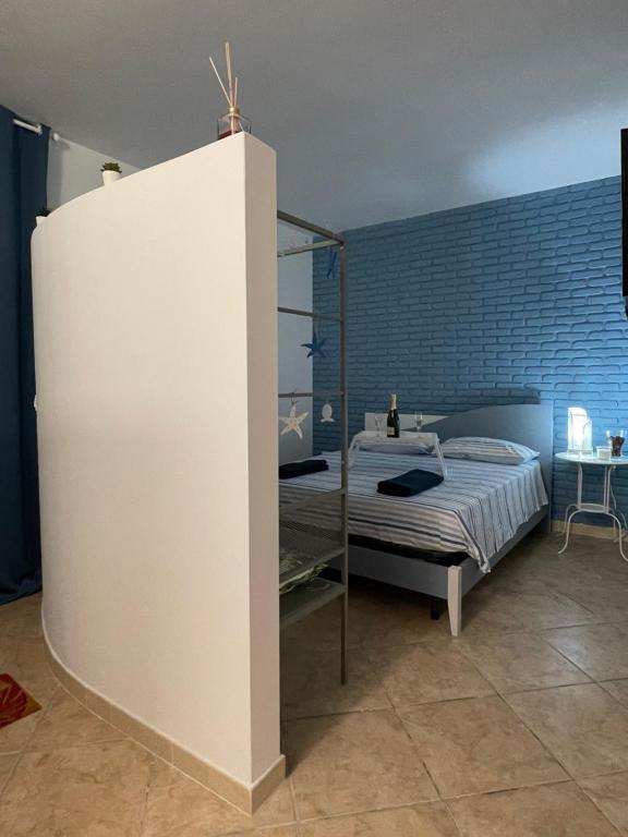 Postel nebo postele na pokoji v ubytování QuamMare