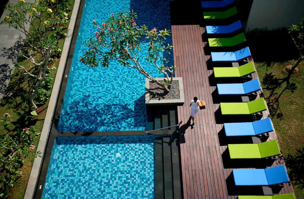 Bazén v ubytování Hotel Santika Mataram nebo v jeho okolí