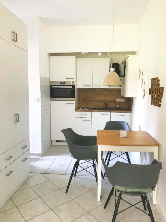 Kuchyň nebo kuchyňský kout v ubytování Komfort Ferienwohnung C4