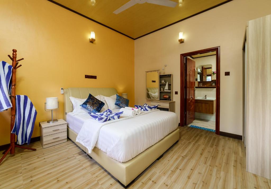Postel nebo postele na pokoji v ubytování Sea View Villa Ukulhas