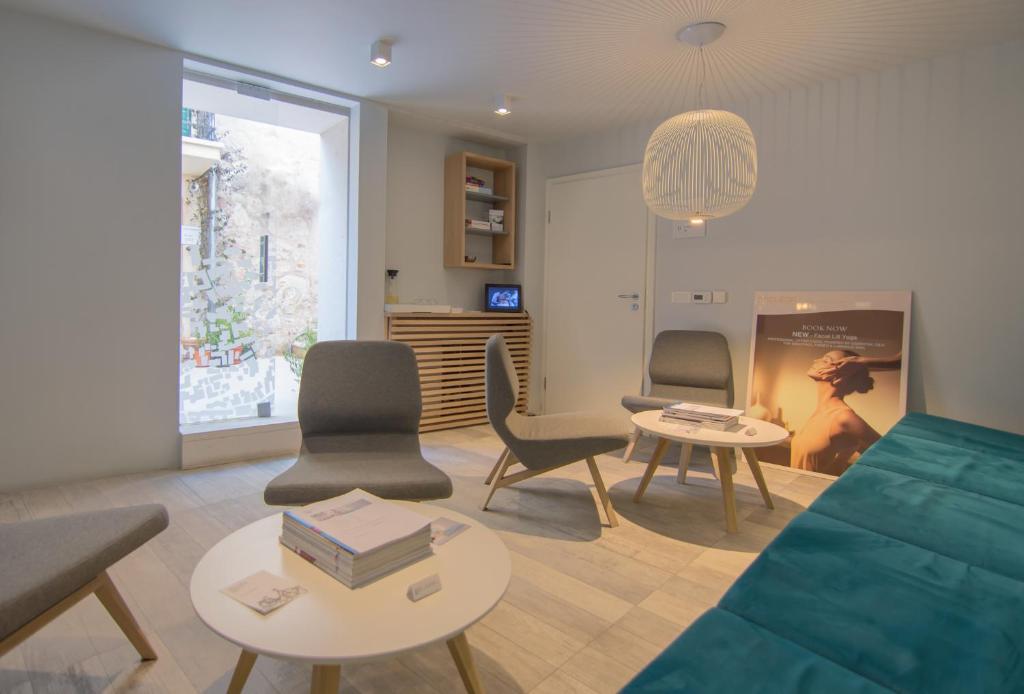 Posezení v ubytování Divota Apartment Hotel