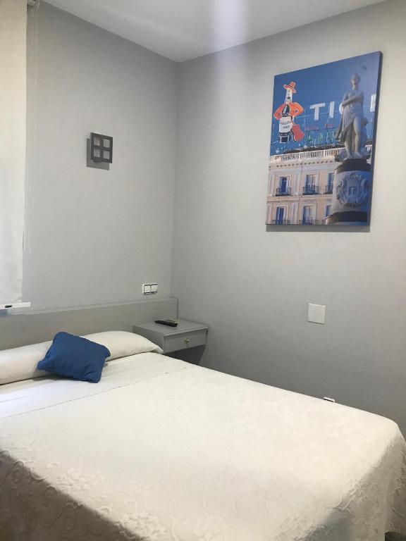 Postel nebo postele na pokoji v ubytování Hotel Mirador