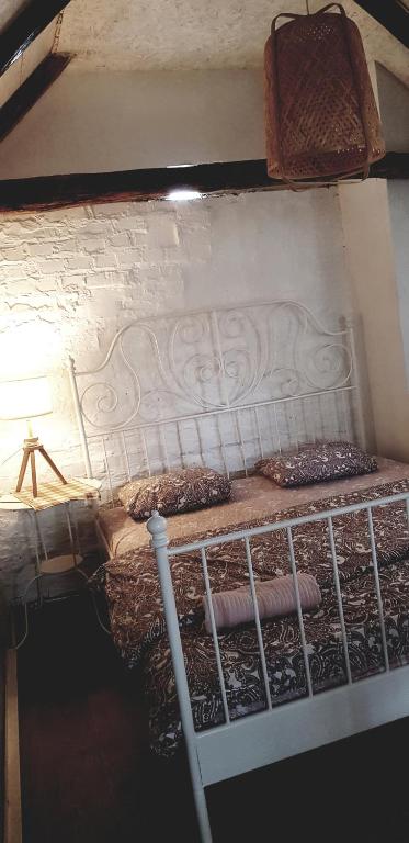 Postel nebo postele na pokoji v ubytování Domacinstvo Cikic Zasavica