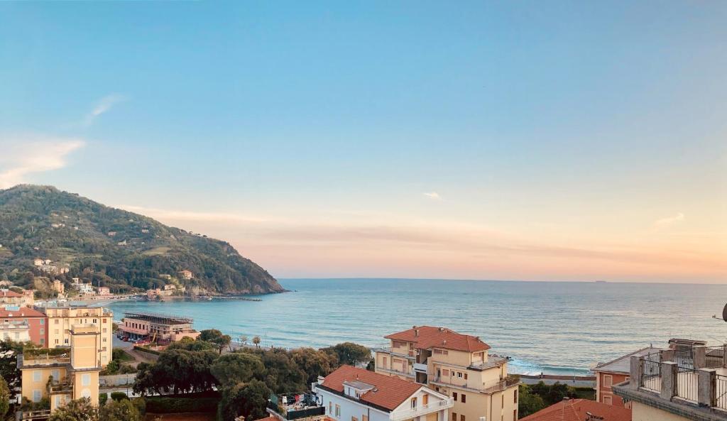 a view of the ocean from a city at Casa Formis in Levanto