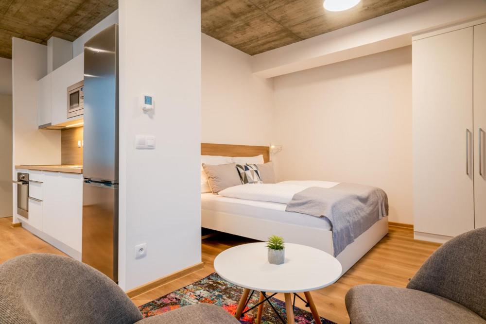 Letto o letti in una camera di ARMEX LiveCentrum