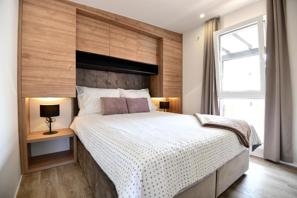 Posteľ alebo postele v izbe v ubytovaní Exclusive Apartments WithLove Zadar