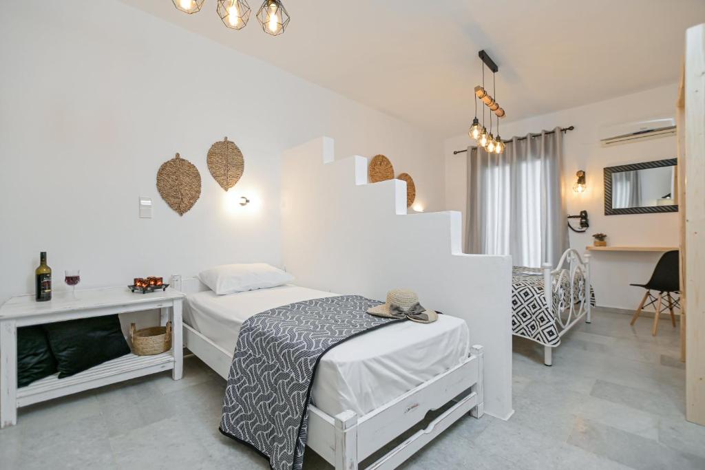 Postel nebo postele na pokoji v ubytování Casa Verde Di Naxos