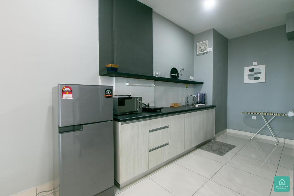 Kuchyň nebo kuchyňský kout v ubytování Jomstay Octagon Duplex Penthouse Ipoh Town