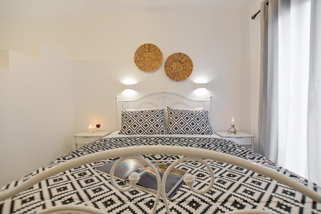 Postel nebo postele na pokoji v ubytování Casa Verde Di Naxos