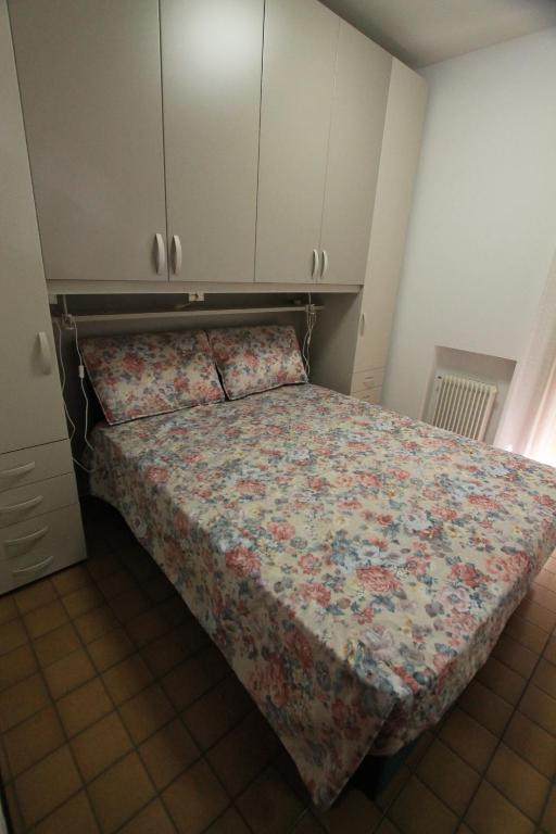 A bed or beds in a room at FLAT BIBIONE