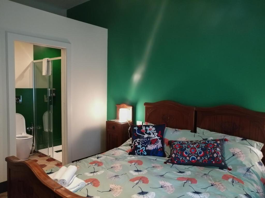 Posteľ alebo postele v izbe v ubytovaní La Terrazza Del Fotografo