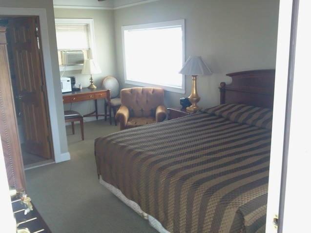 Postel nebo postele na pokoji v ubytování Golden Gate Lodging