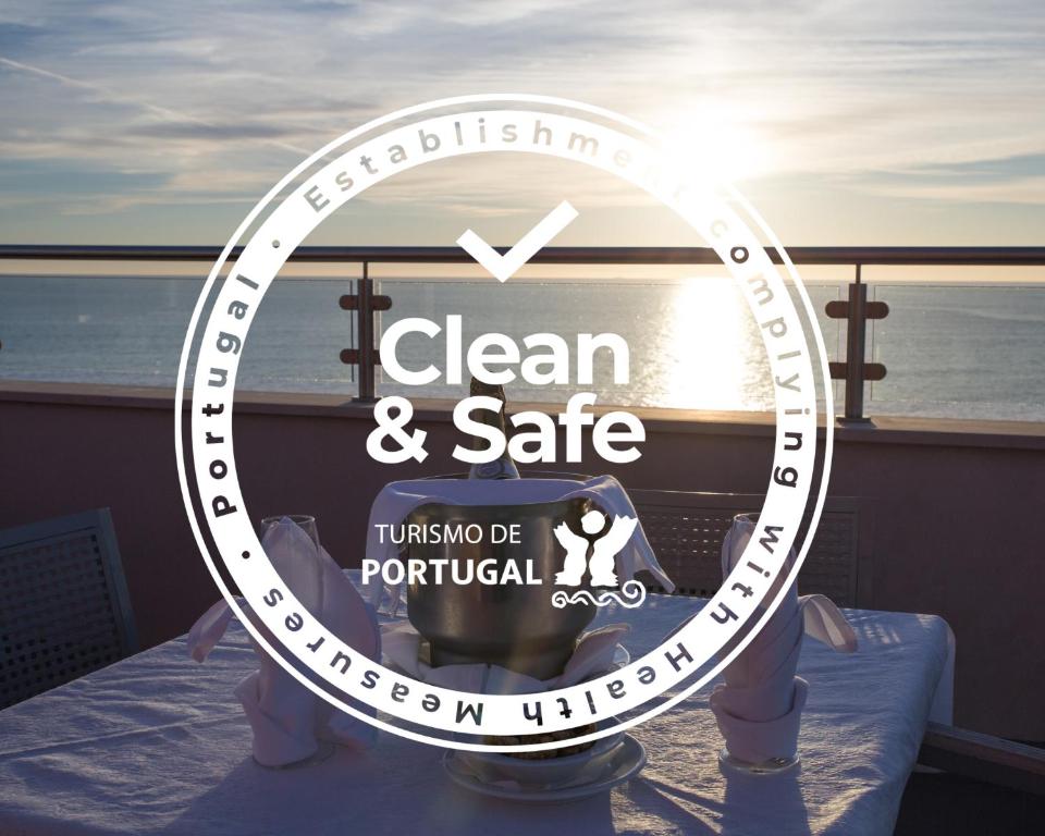 a clock that reads clean and safe on a cruise ship at Hotel Quarteirasol in Quarteira