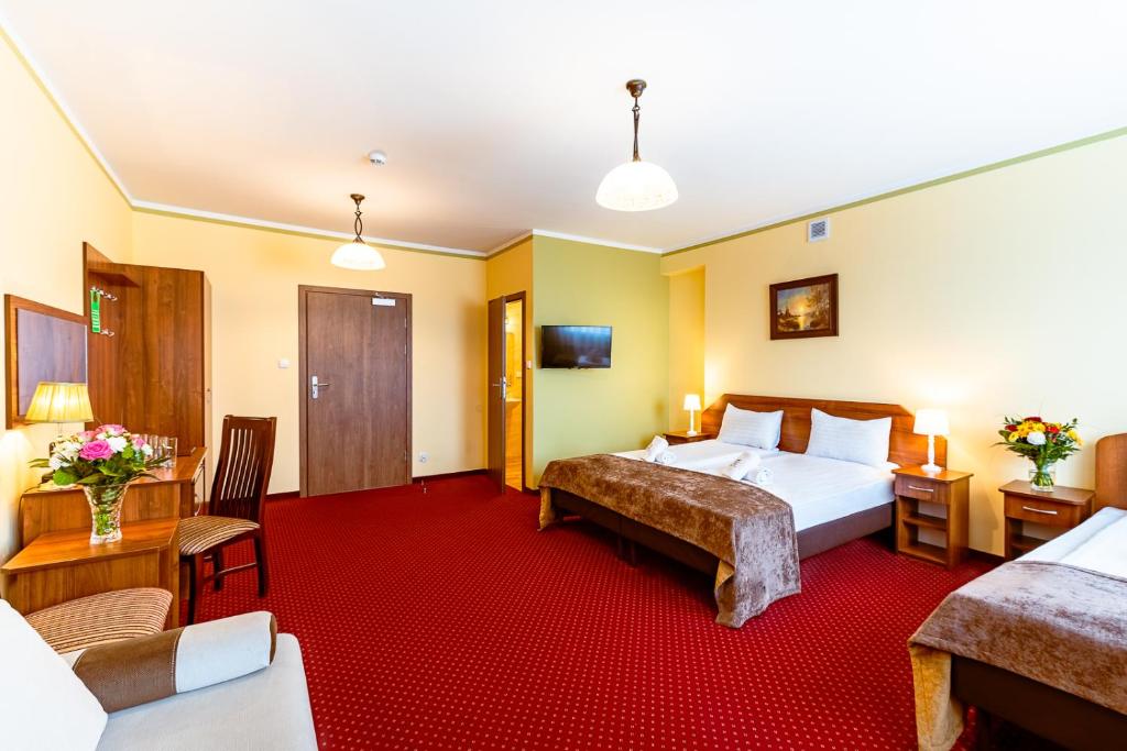 Hotel Kasztelan - Habitación Cuádruple
