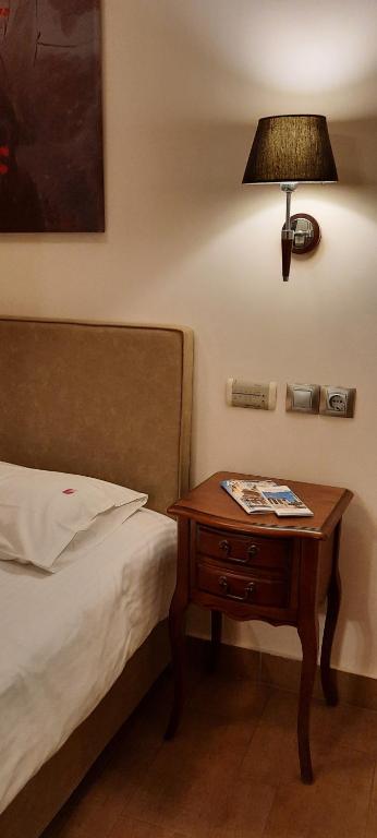 Posteľ alebo postele v izbe v ubytovaní Olympic Fashion Hotels