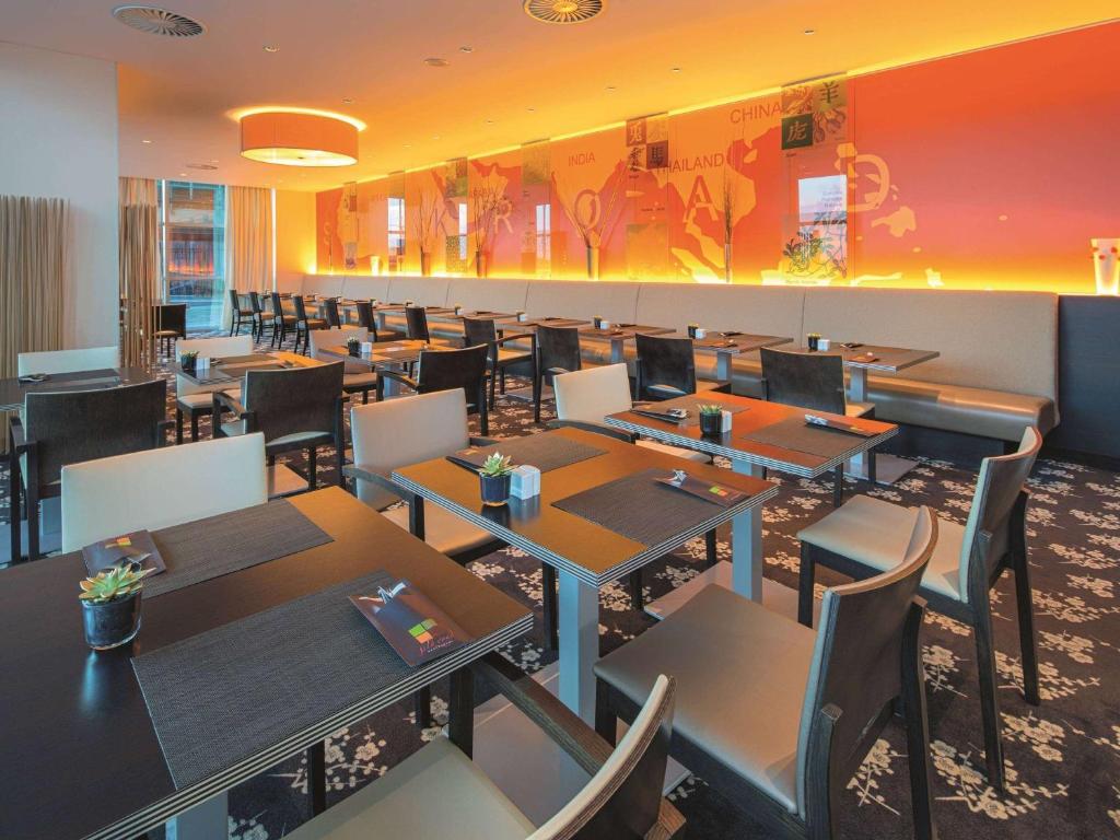 Restaurant ou autre lieu de restauration dans l'établissement Mövenpick Hotel Amsterdam City Centre