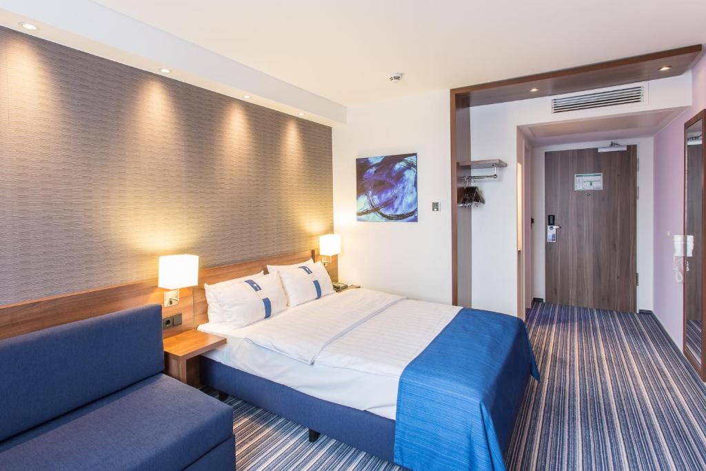 Postel nebo postele na pokoji v ubytování Holiday Inn Express Neunkirchen by IHG