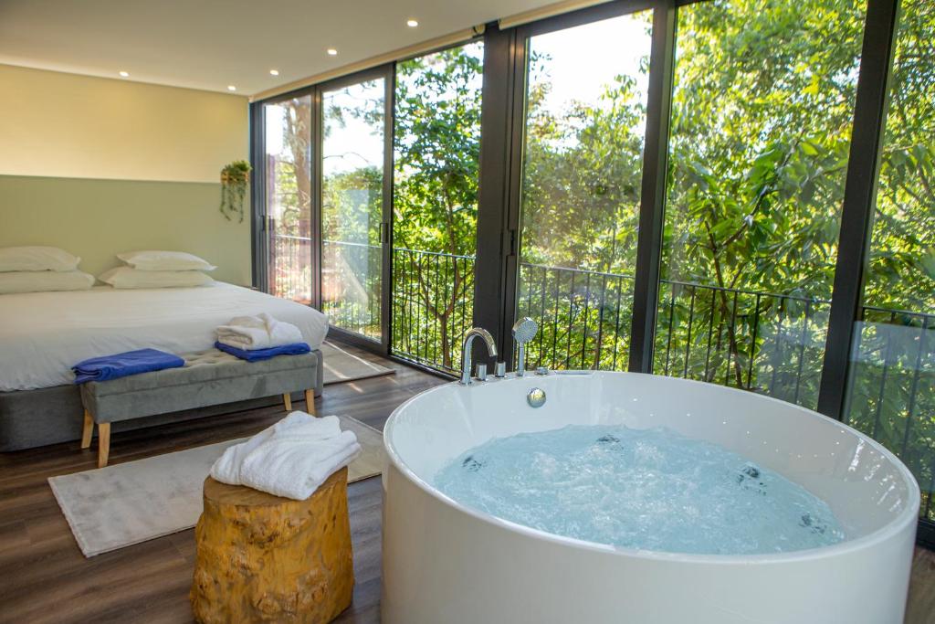 Uma cama ou camas num quarto em Peso Village