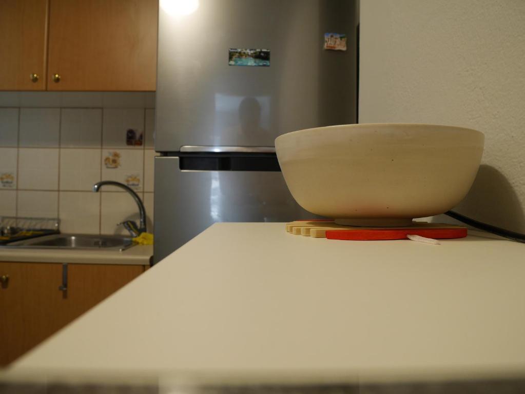 Kuchyň nebo kuchyňský kout v ubytování Porto Plaza City Center Apartment AC/Wifi