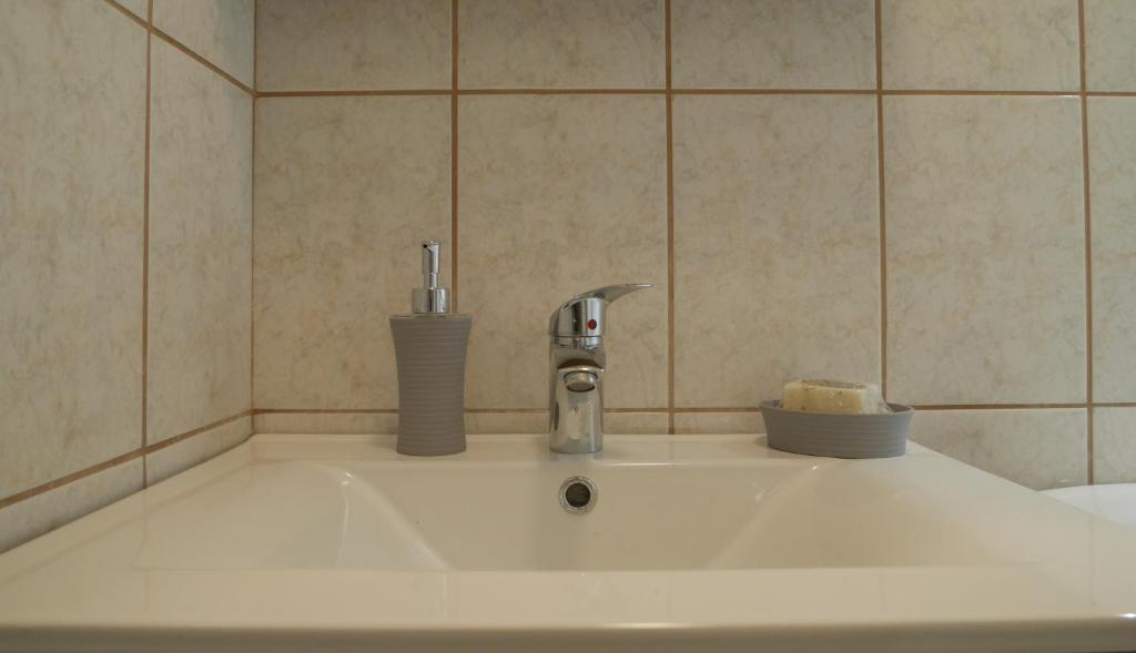 Koupelna v ubytování Porto Plaza City Center Apartment AC/Wifi