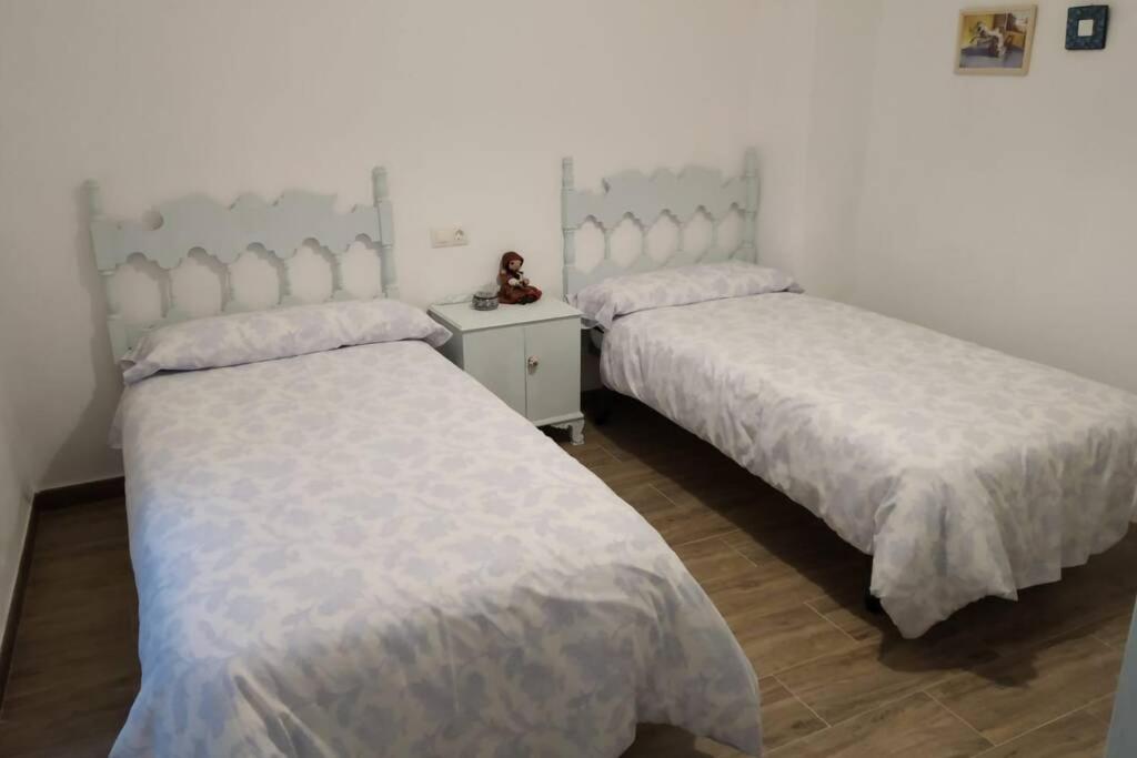 Postel nebo postele na pokoji v ubytování Vivienda rural Mogón-Junto al Guadalquivir B