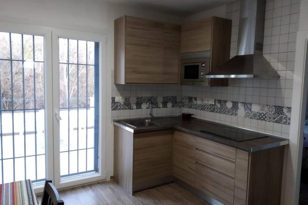 Kuchyň nebo kuchyňský kout v ubytování Vivienda rural Mogón-Junto al Guadalquivir B