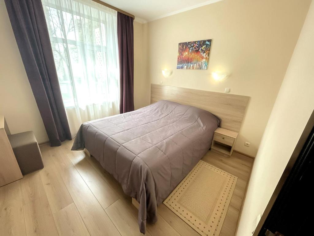 Postel nebo postele na pokoji v ubytování Oberig Hotel