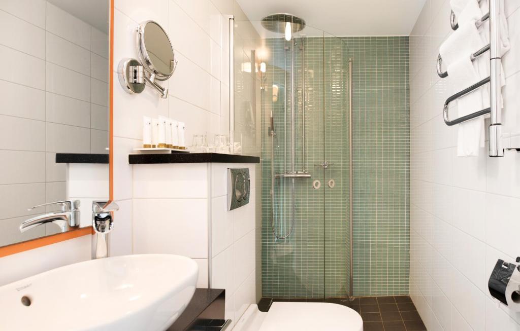 Koupelna v ubytování ProfilHotels Savoy