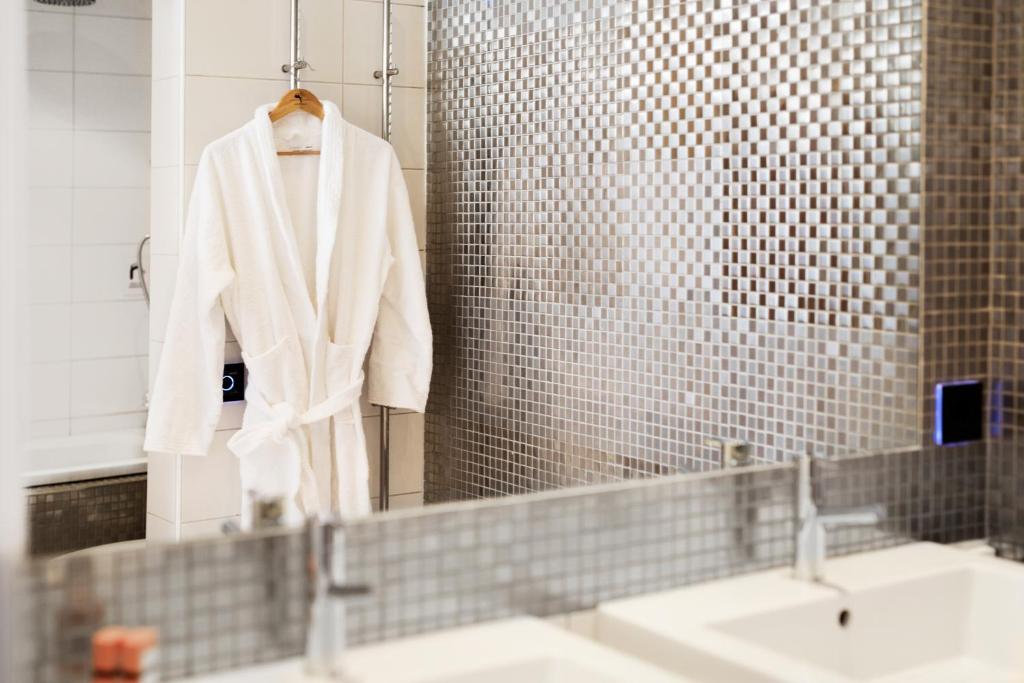 Koupelna v ubytování ProfilHotels Savoy