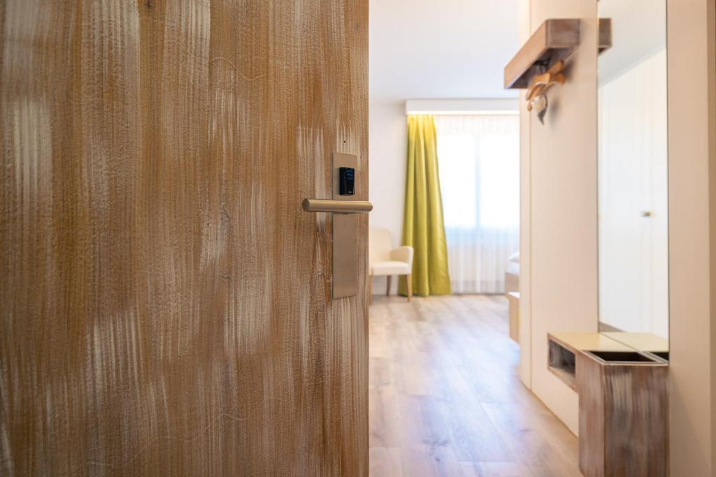 TV a/nebo společenská místnost v ubytování Garni Hotel Torkelbündte
