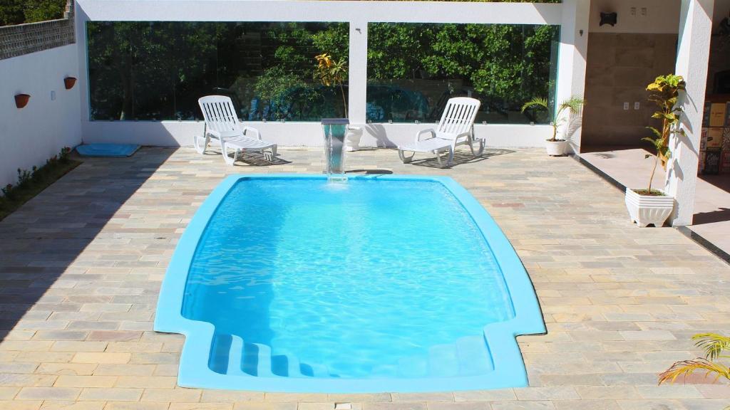  Casa com piscina privativa e poucos passos do mar em Cotovelo por Carpediem