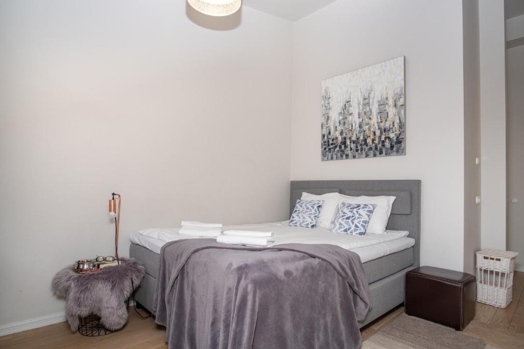 Postel nebo postele na pokoji v ubytování Mere Residence 24H Reception