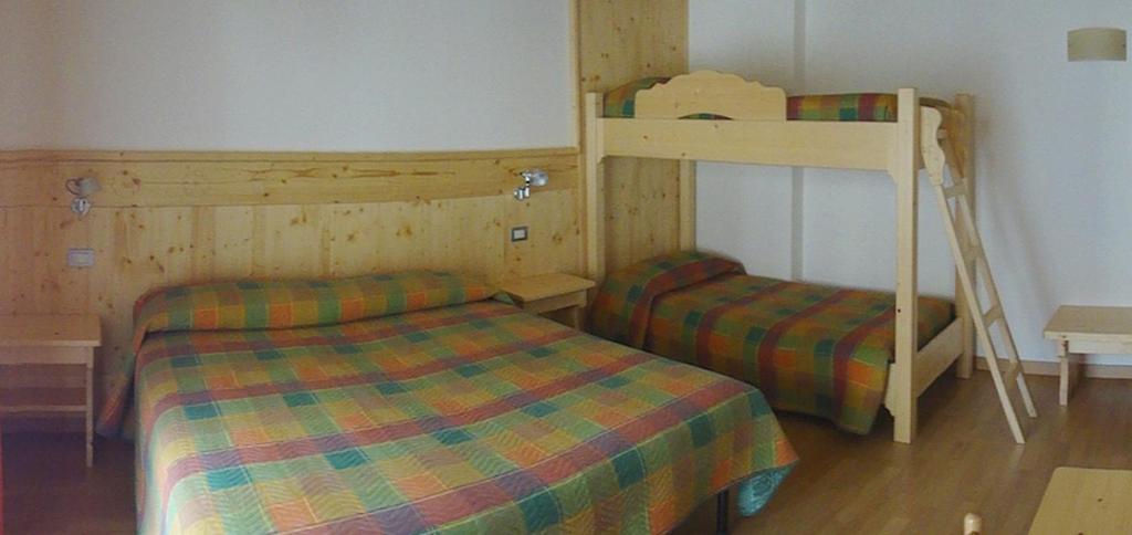 Postel nebo postele na pokoji v ubytování Albergo Ristorante Baraglia