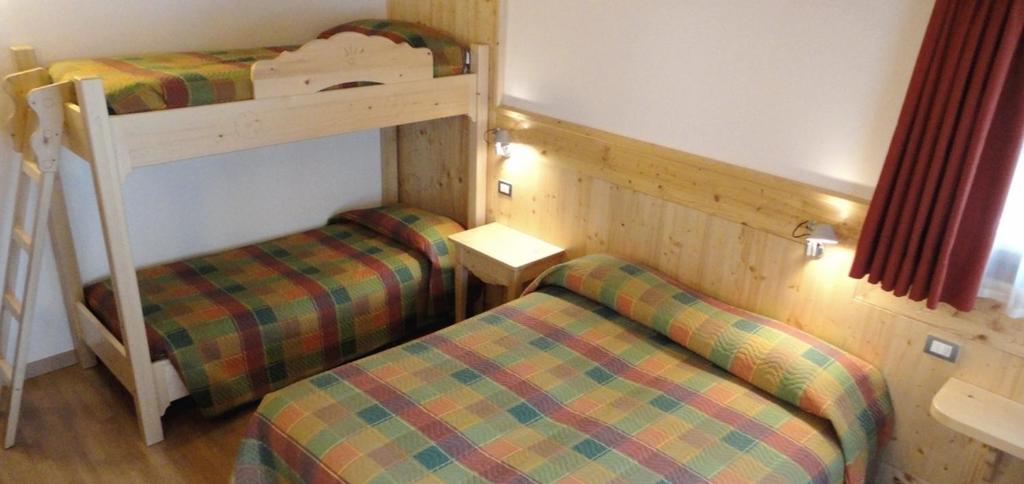 Postel nebo postele na pokoji v ubytování Albergo Ristorante Baraglia
