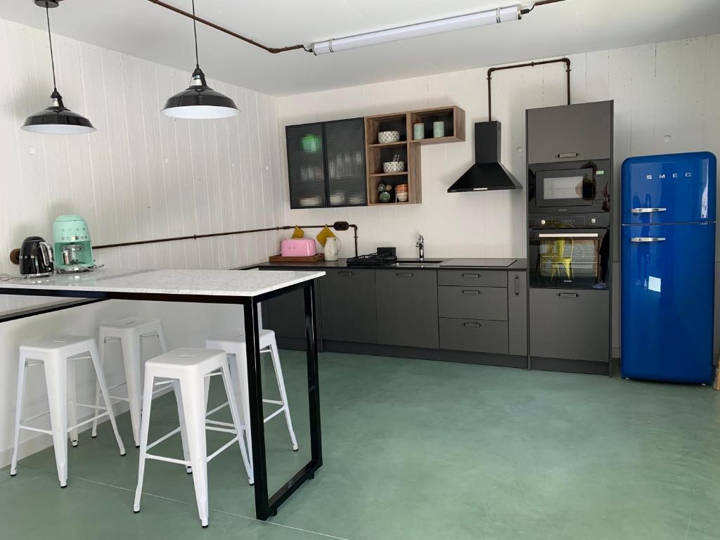 Kuchyň nebo kuchyňský kout v ubytování Appart'hotel Fior Di Ribba
